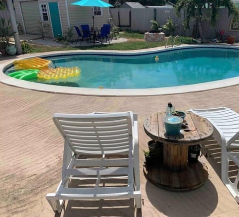 Lounge chair sun tanning view while getting ready to dip into your heated pool
