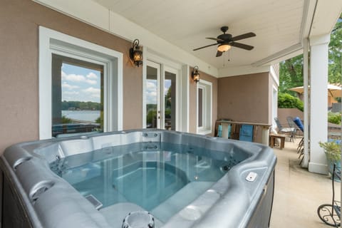 Welcome to Norman Keys. Enjoy the lake views from the hot tub.