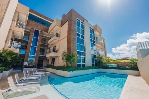 Aracari pool deck includes in-water loungers, offering a luxurious and refreshing relaxation experience.