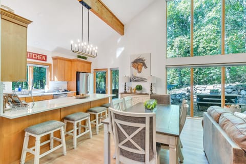 Indoor and outdoor dining tables, complemented with 4 bar stools.