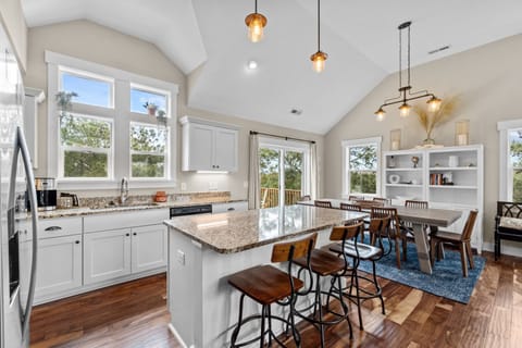 Kitchen with Bar Seating on Third Level