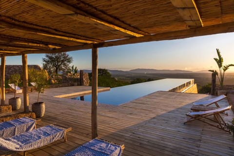 Activities, Amenities, Balcony / Terrace / Patio, Building Exterior, Facilities, Garden, Pool, Scenic View, Spring, Summer, Wellness