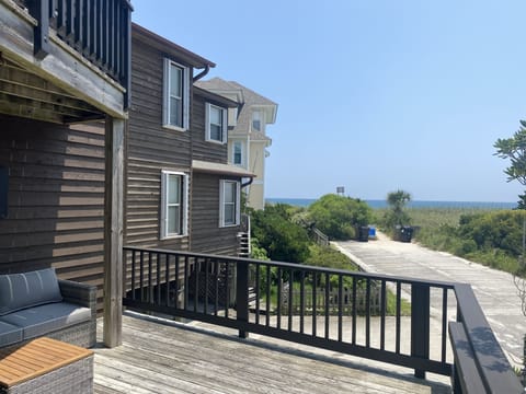 Oceanside view one house from beach access. Easily walk from porch to beach. 