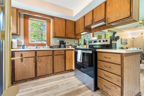 Full kitchen with stainless dishwasher