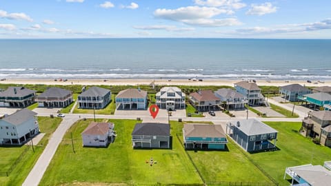 Close to beach with walk on and golf cart access. Large yard with stone firepit.