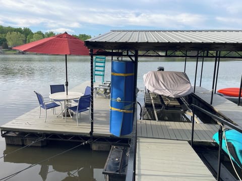 The dock slip is not available. You can tie a boat off the swim platform.