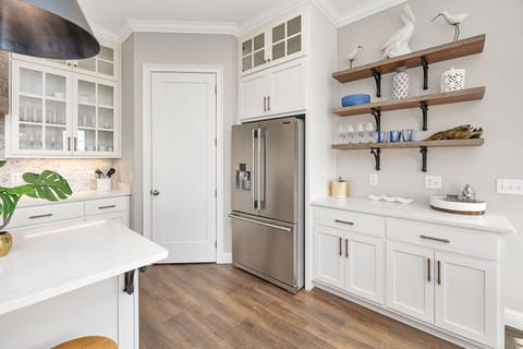 Chef's kitchen with a bar area