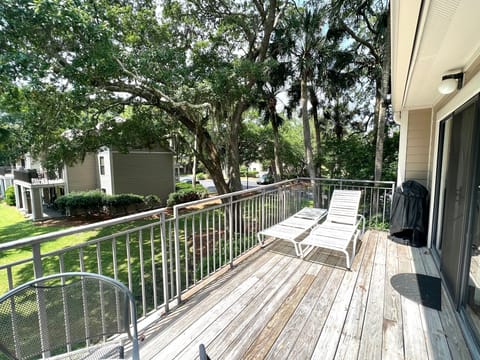 Enjoy sunbathing and relaxation on the spacious deck, complete with comfortable lounge chairs.