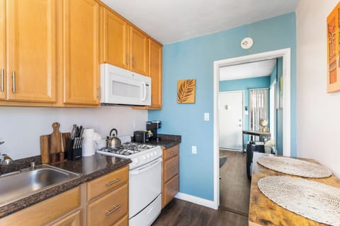 Kitchen- Supplied with new steel cookware, dishes, wine glasses, 