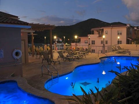 Night view of the hot tub and pool