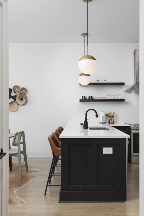 Seating for 4 at the kitchen counter. The kitchen is fully-stocked and ideal for anyone who enjoys cooking & convening.