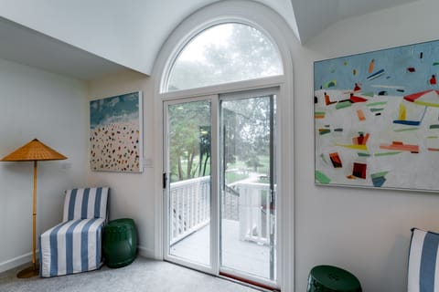 The small loft at the top of the stairs.  Sliding doors lead out to the second floor deck