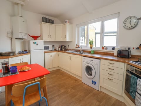 Fridge, electric kettle, toaster, cookware/dishes/utensils