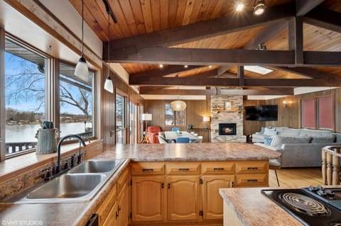 Enjoy conversations with everyone from the kitchen