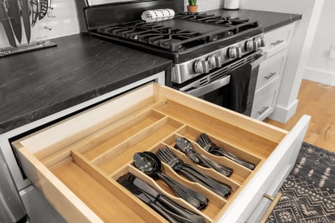 Well-organized kitchen drawer, a functional and stylish culinary space.