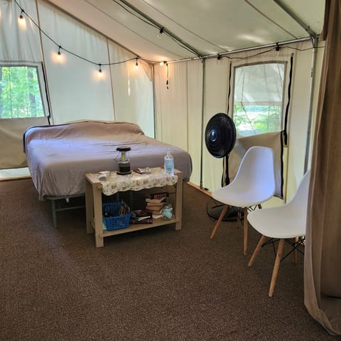 Queen bed w/ pedestal fan