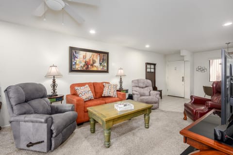 Cozy living room with plush seating and warm lighting