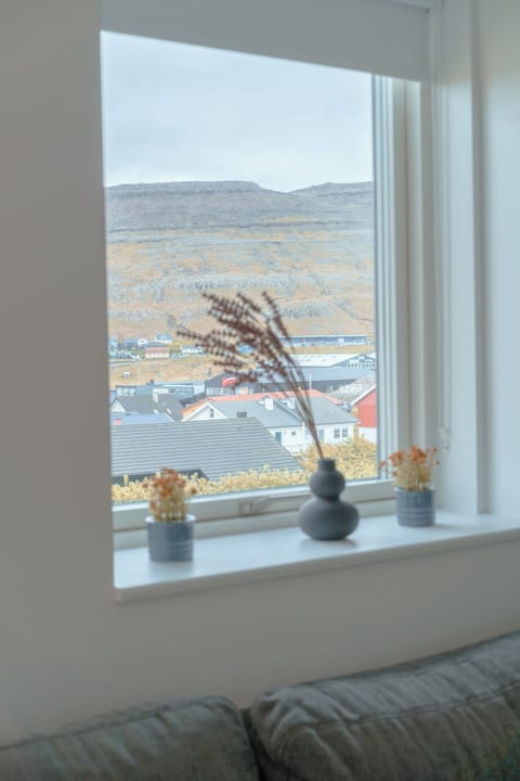 Apartment | Living area | 40-inch flat-screen TV with satellite channels, heated floors