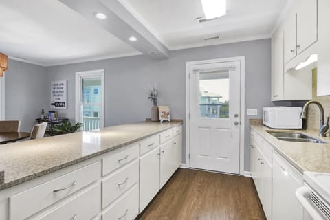 Well stocked galley style kitchen; Unit A
