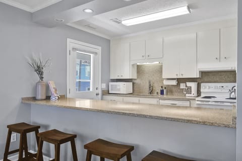 Additional bar seating so you can chat with the cook; Unit A