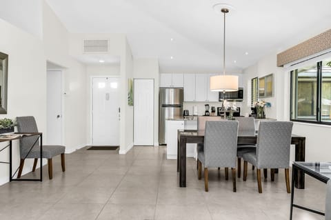 The dining table set seats 6 guests comfortably. This intimate space is perfect for families and friends to dine in comfort and style. There are 2 additional counter stools at the kitchen island.
