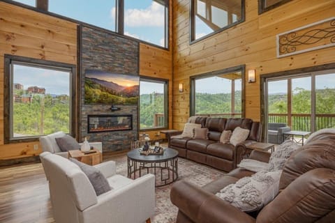 Cabin, Multiple Beds, Hot Tub | Living area | 65-inch flat-screen TV with digital channels, TV, fireplace