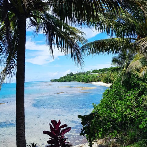 Beach nearby, white sand, beach towels