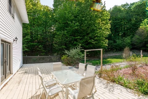 Private patio w/ outdoor dining set, ideal for morning coffee or sunset wine