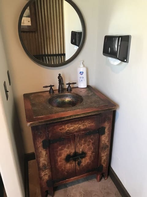 Grain bin bath house provides 2 full-service bathrooms. Shared by up to 8 other guests