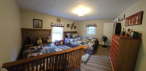 upstairs bedroom with 2 queen beds