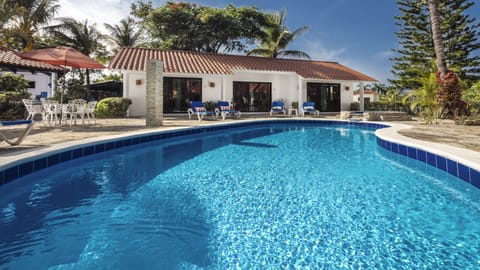 Outdoor pool, pool umbrellas, sun loungers