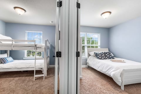 The bunk bedroom now has three bunks