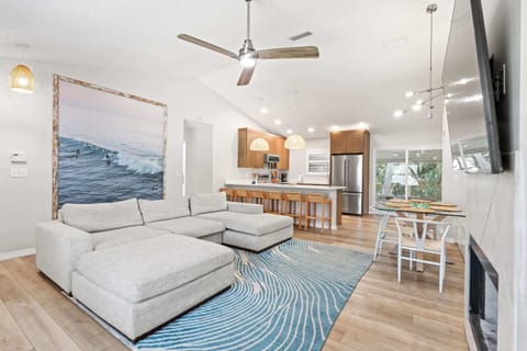 Open-concept living, dining, and kitchen space.