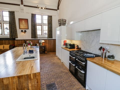 Fridge, electric kettle, toaster, cookware/dishes/utensils