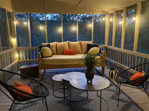 Screened in porch for enjoying summer nights.