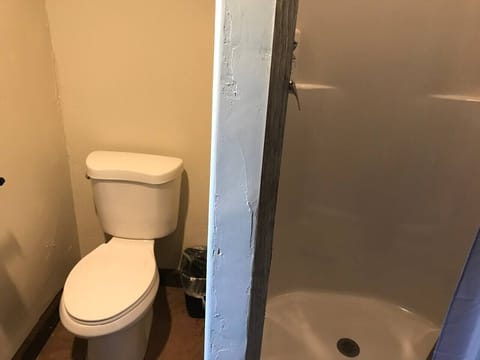 Bathrooms in grain bin bath house are sometimes shared with as many as 8 other people