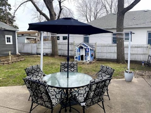 Enjoy the private patio while kids play in the fenced back yard