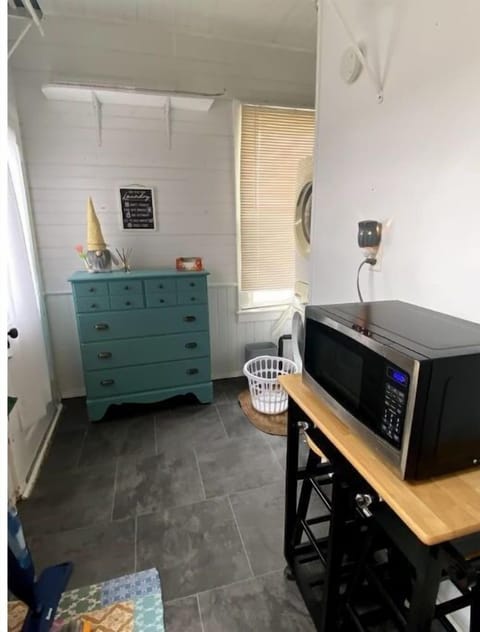 Large laundry room off the kitchen with full washer & dryer for your use.
