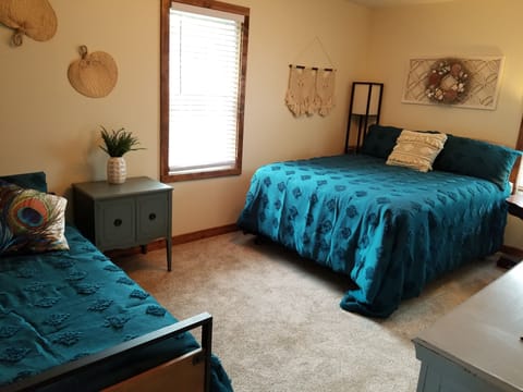 queen, daybed and trundle on main level. This room has a private bathroom.