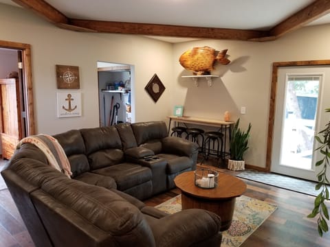 standing in dining area looking at the living room 