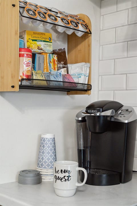 Stocked coffee station in kitchen.