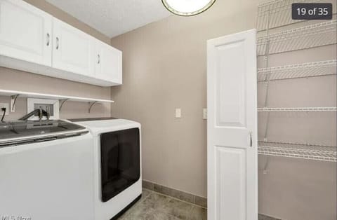 laundry room with washer and dryer
