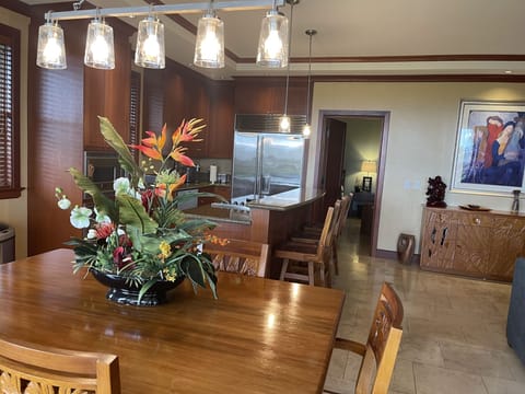 View of kitchen and entry to an ensuite bedroom
