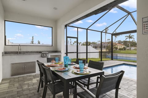 Villa Lola has outdoor dining with room for 6 & an outdoor kitchen