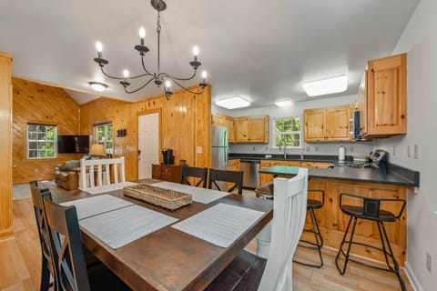 Kitchen features new countertops and stainless steel appliances.