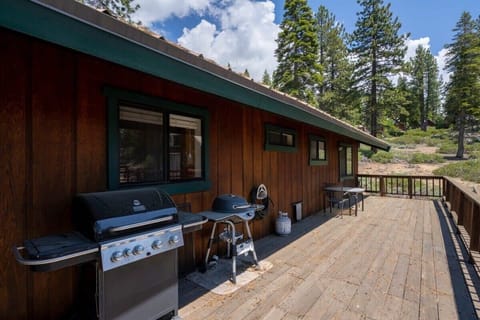 Your group will love spending summer days out on the deck where you can enjoy views of the lake through the surrounding trees. (Grill is available during the summer months)