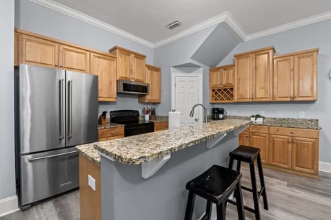 Upgraded kitchen space with breakfast bar!