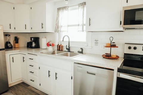 A modern and fully-equipped kitchen for cooking. 