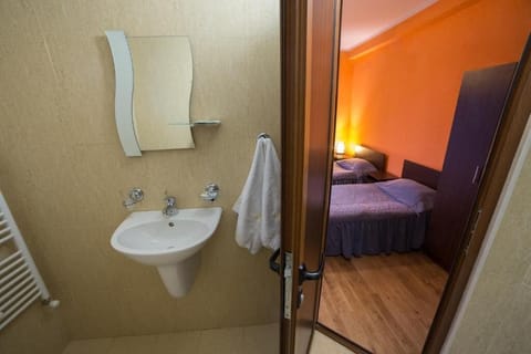 Rainfall showerhead, towels, soap, shampoo