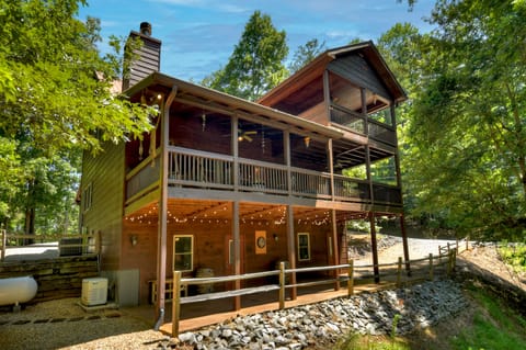 3 story deck with view of tranquil forest and plenty of outdoor seating! 
